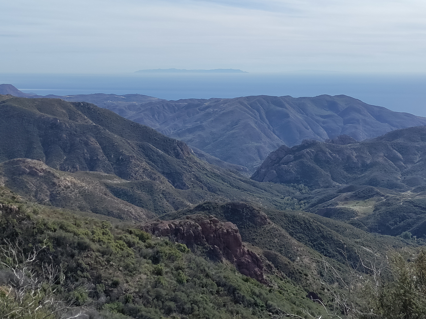 An image depicting the trail Zuma Canyon - Backbone Short Trail and its surrounding area.