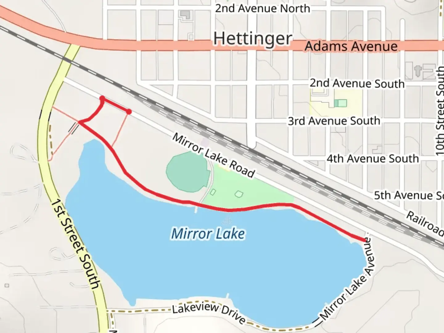 An image depicting the trail Mirror Lake Park Walk and its surrounding area.