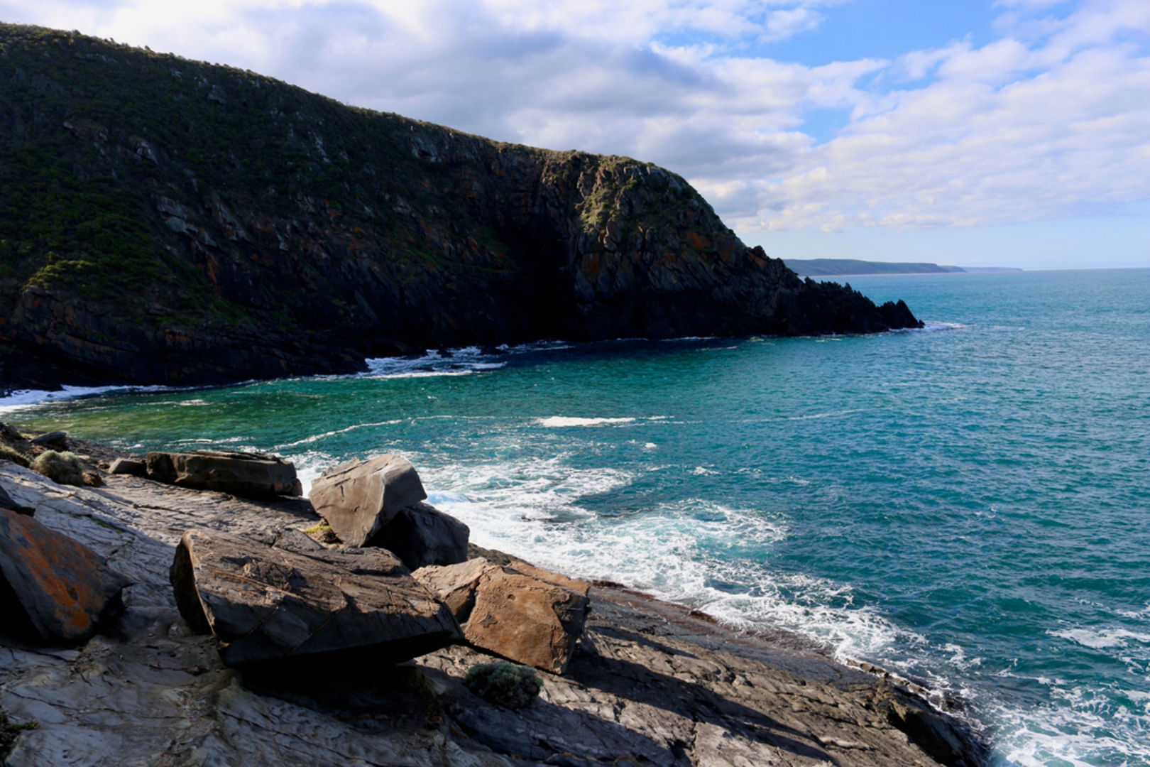 An image depicting the trail Deep Creek Cove Track from Tapanappa Lookout and its surrounding area.