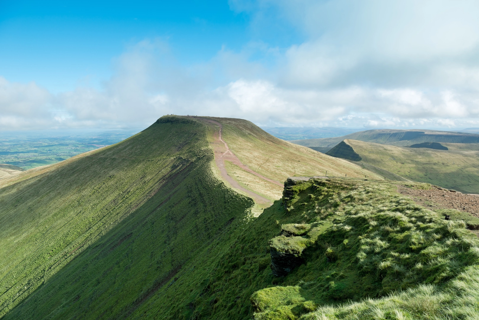 An image depicting the trail Pen y Fan from Cwmgwdi near Brecon and its surrounding area.