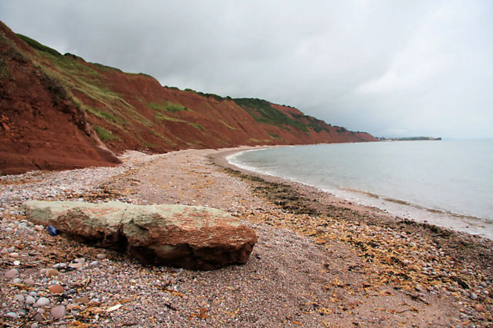 An image depicting the trail Sidmouth to Exmouth Walk and its surrounding area.