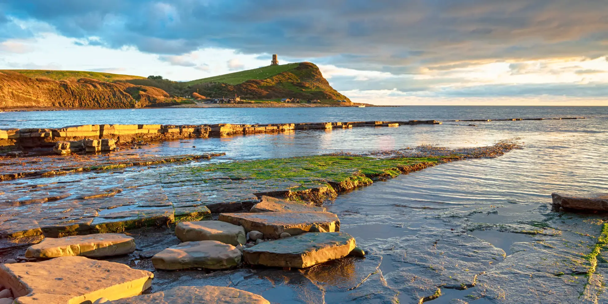An image depicting the trail Tom's Field - Kimmeridge Circular Walk and its surrounding area.