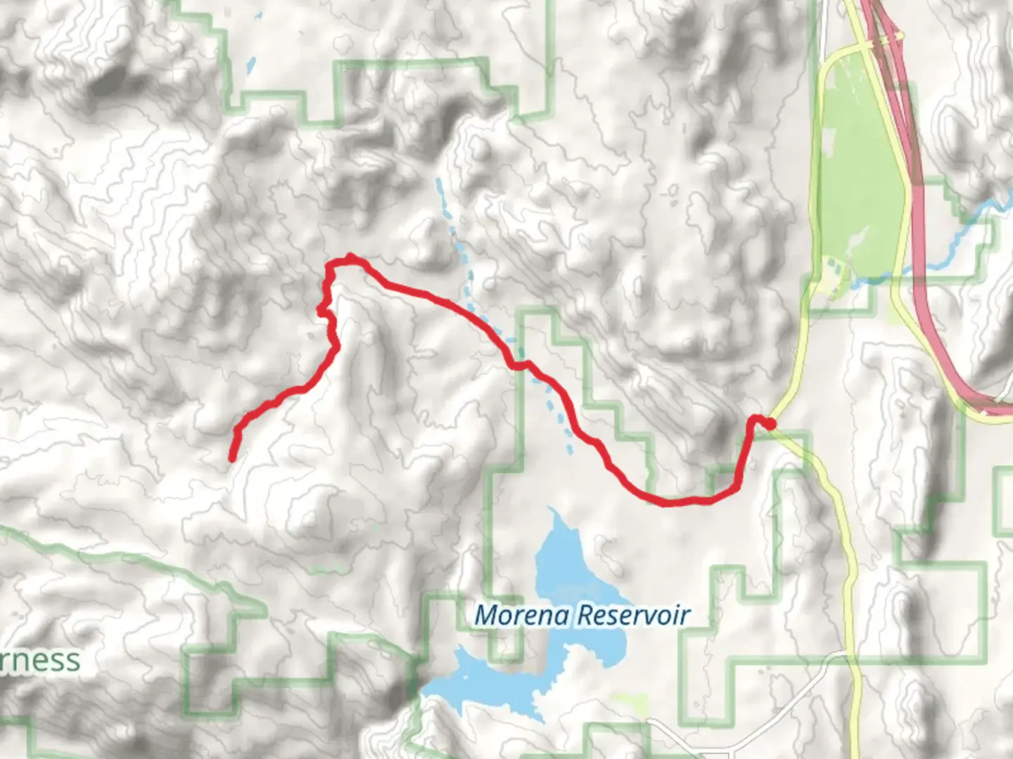 An image depicting the trail Corral Canyon Road and its surrounding area.