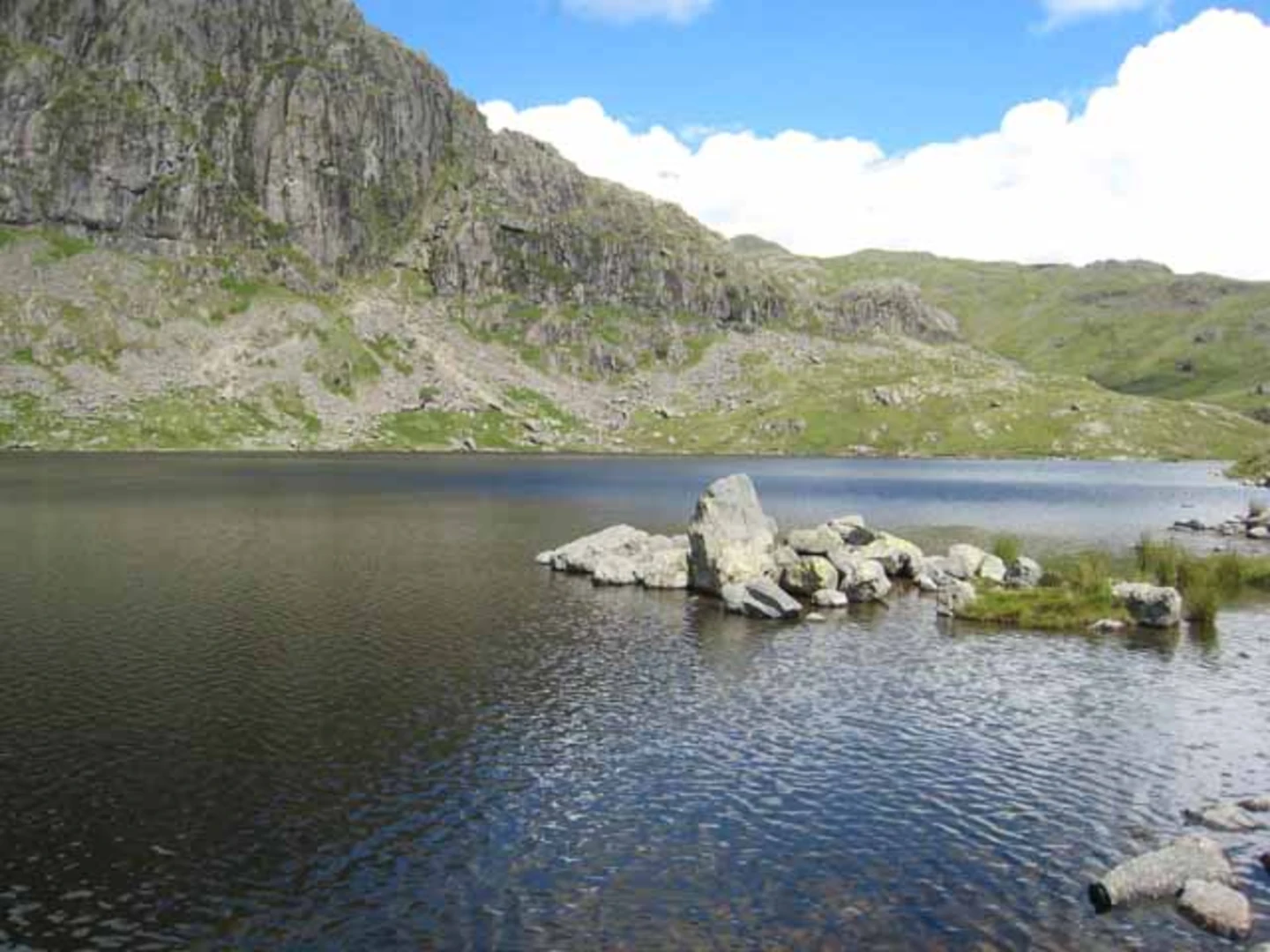 An image depicting the trail Dungeon Ghyll Force Viewpoint and Stickle Tarn and its surrounding area.