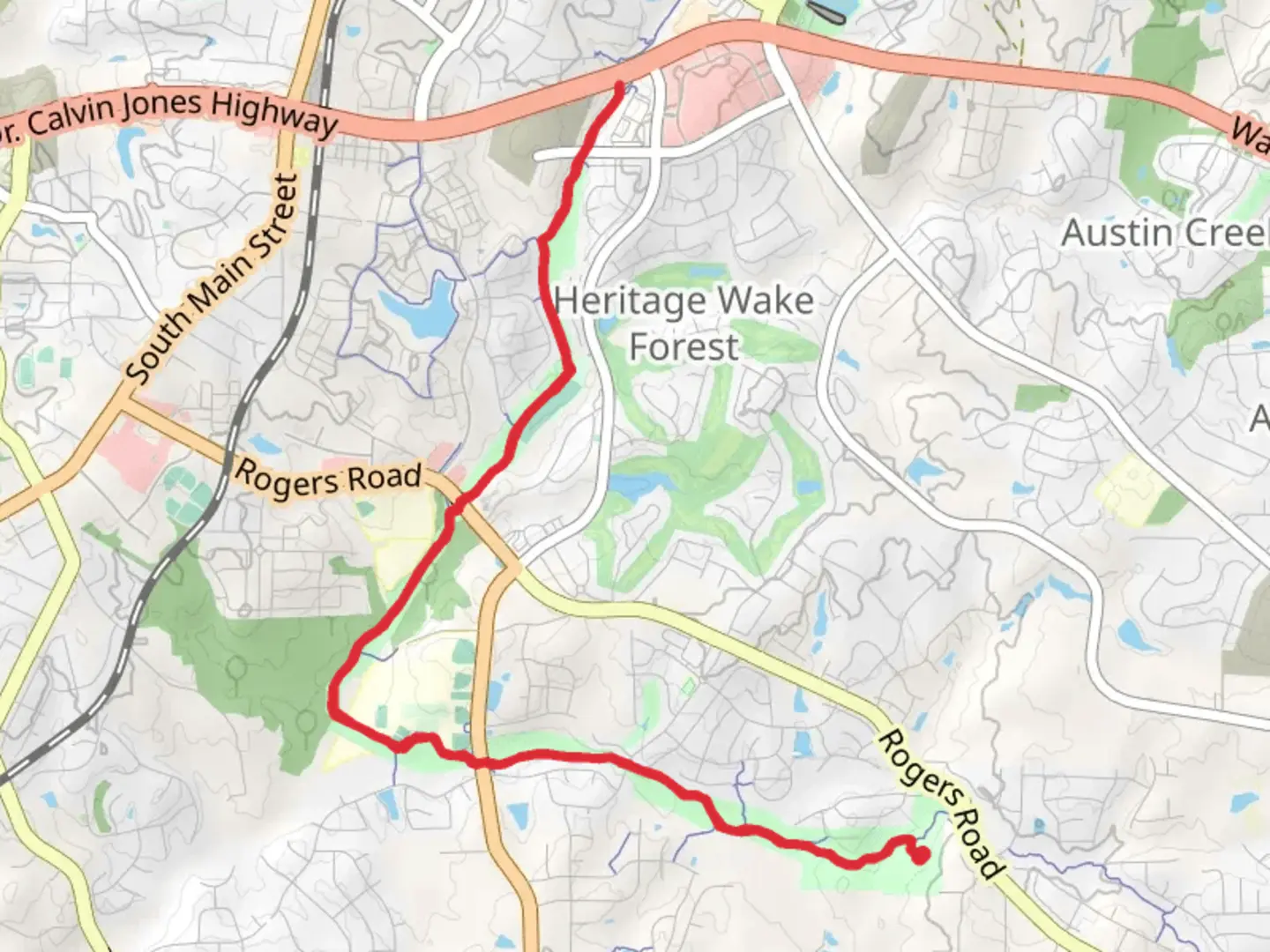 An image depicting the trail Sanford Creek and Dunn Creek Greenway and its surrounding area.