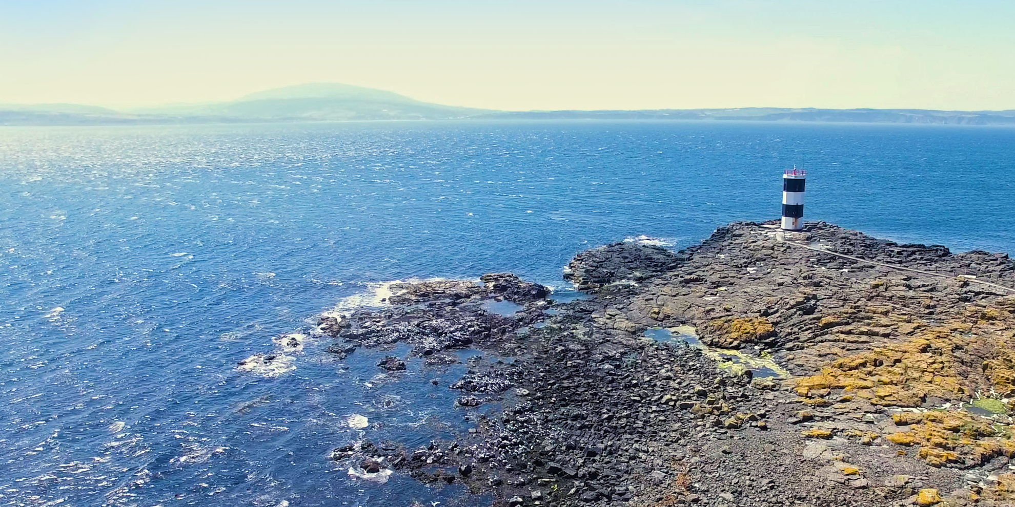 An image depicting the trail Rathlin Island Roonivoolin Walk and its surrounding area.