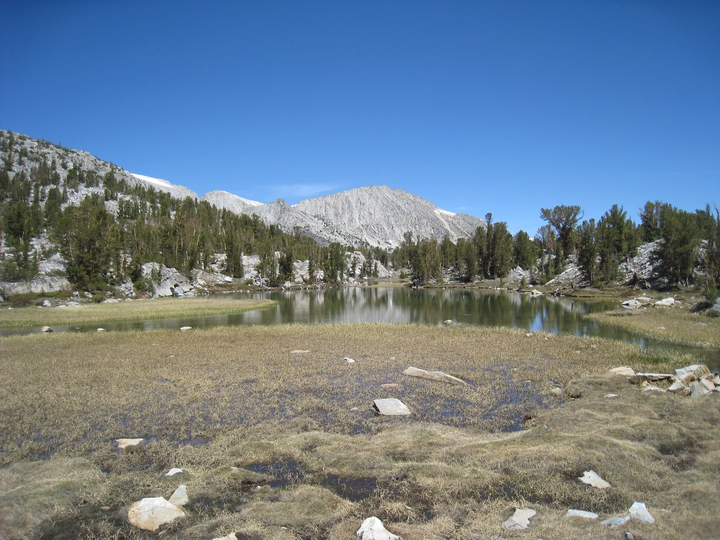 An image depicting the trail Gem Lake, Heart Lake via Little Lakes Valley Trail and its surrounding area.