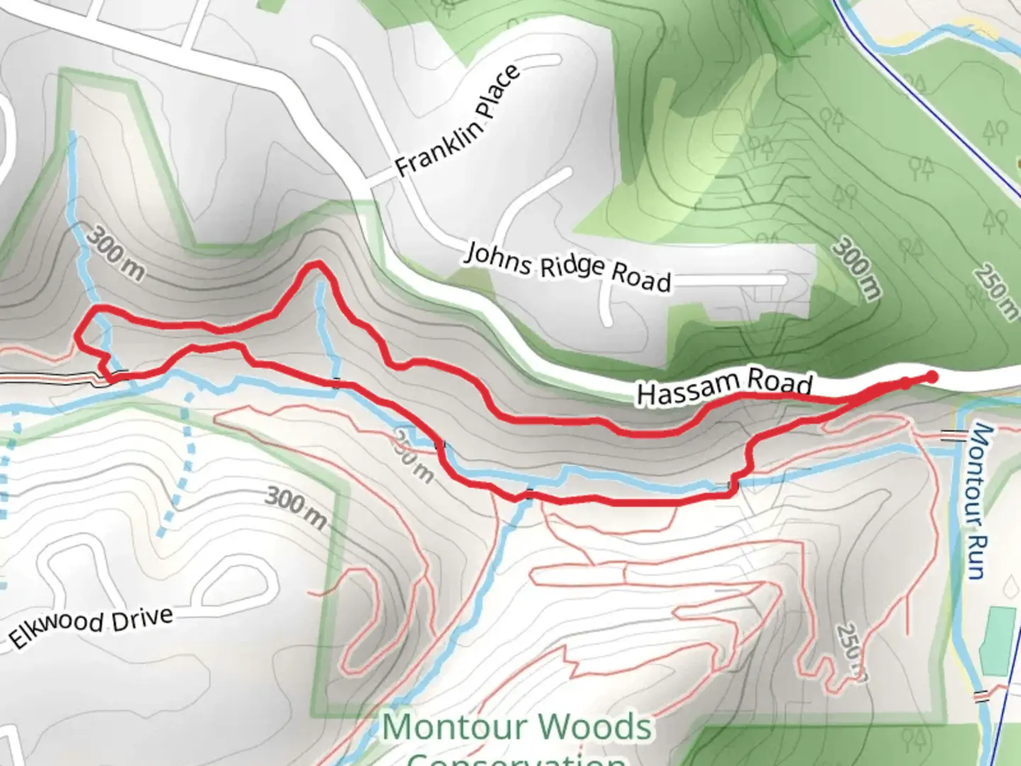 An image depicting the trail Meeks Run and OIl Well Loop Trail and its surrounding area.
