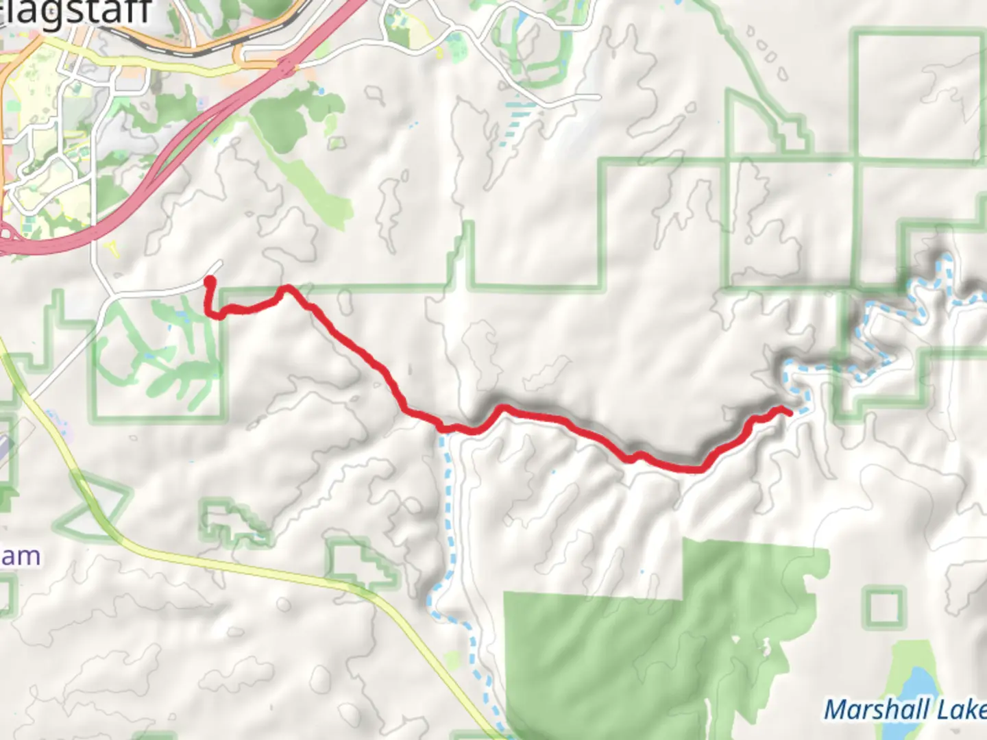 An image depicting the trail Walnut Canyon and its surrounding area.