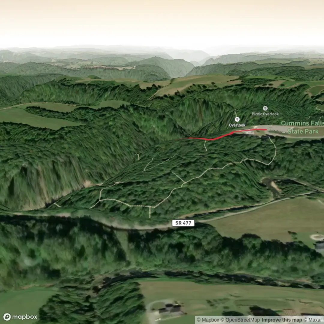 An image depicting the trail Cumin Falls via Falls Route and its surrounding area.