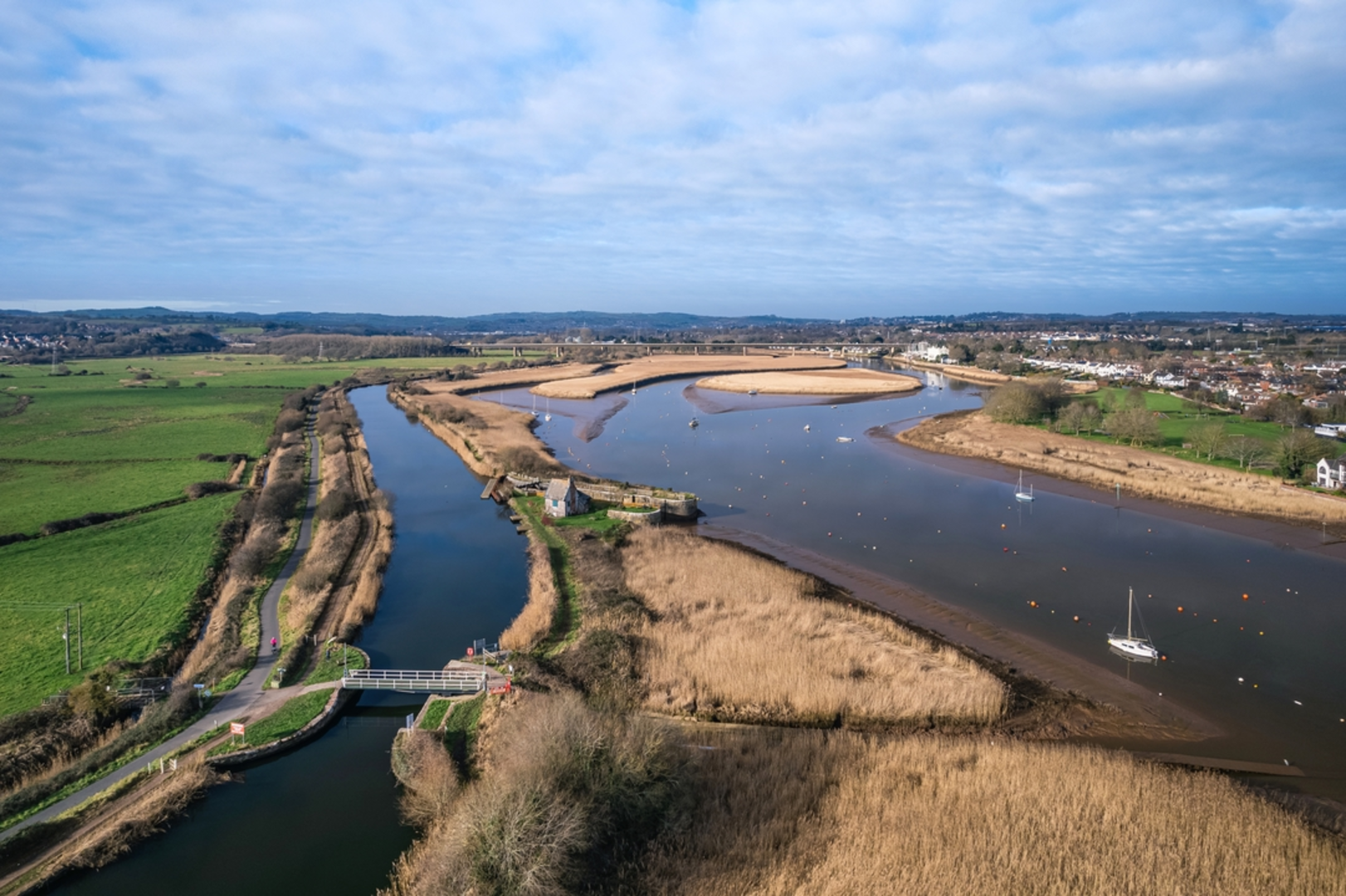 An image depicting the trail Avocet Line - Lympstone to Topsham Walk and its surrounding area.