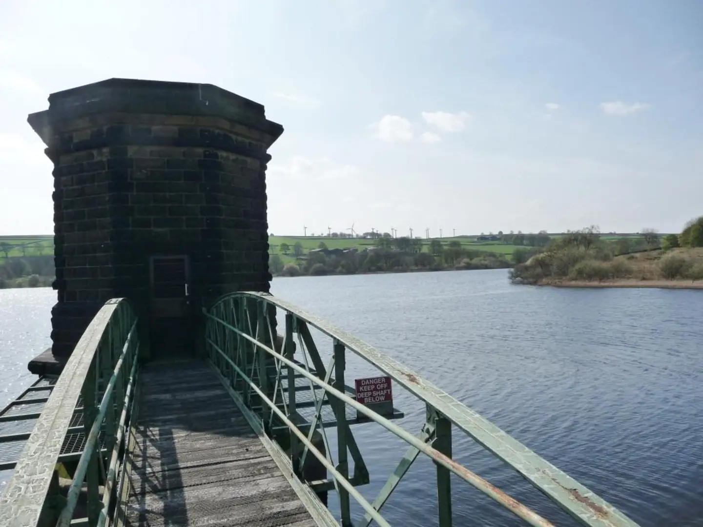 An image depicting the trail Royd Moor Reservoir and its surrounding area.