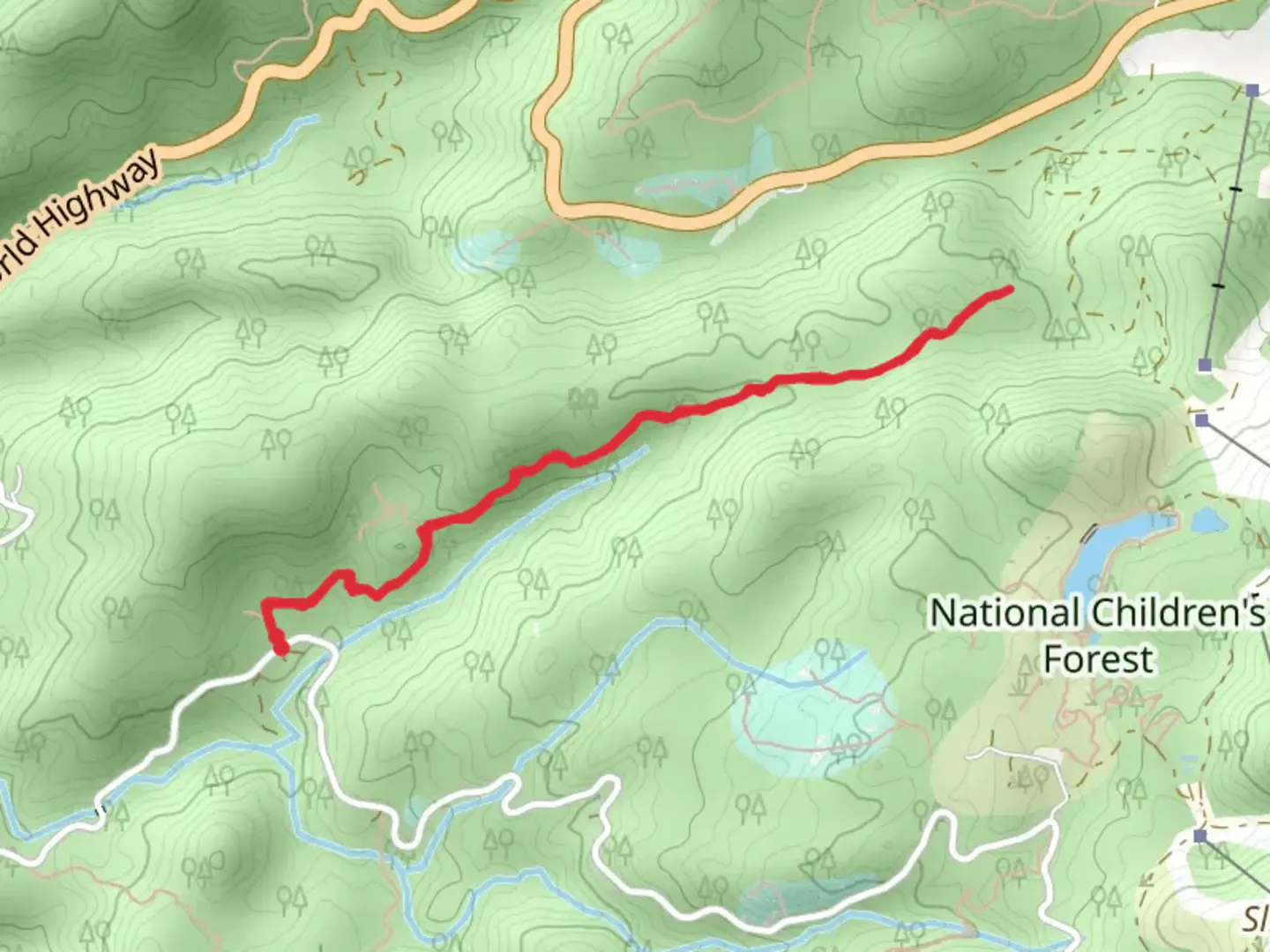 An image depicting the trail Snow Valley Road and its surrounding area.