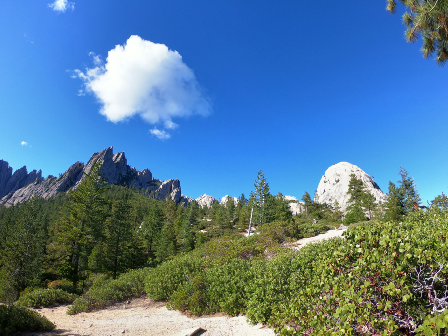 An image depicting the trail Indian Springs via Crags Trail and its surrounding area.