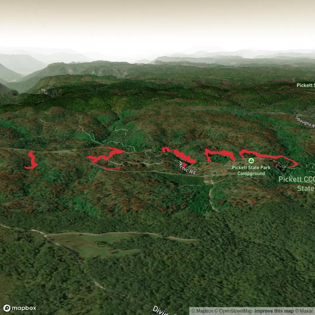An image depicting the trail Indian Rock House via Natural Bridge Trail and Hazard Cave Trail and its surrounding area.
