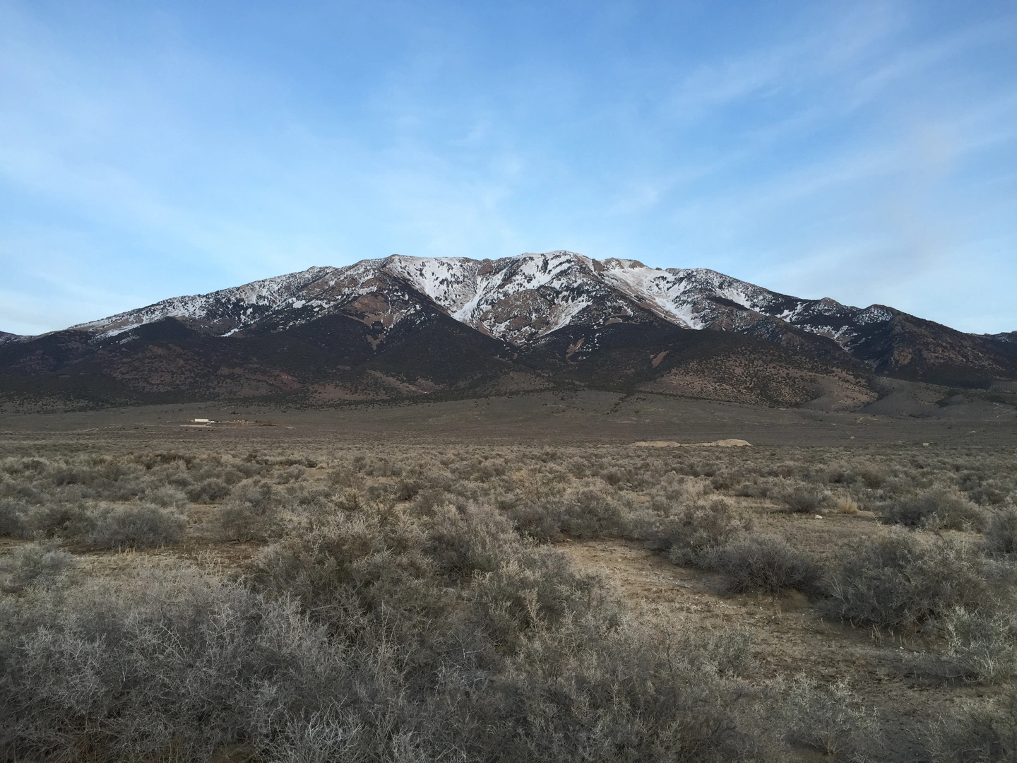 An image depicting the trail Pilot Peak Road and its surrounding area.