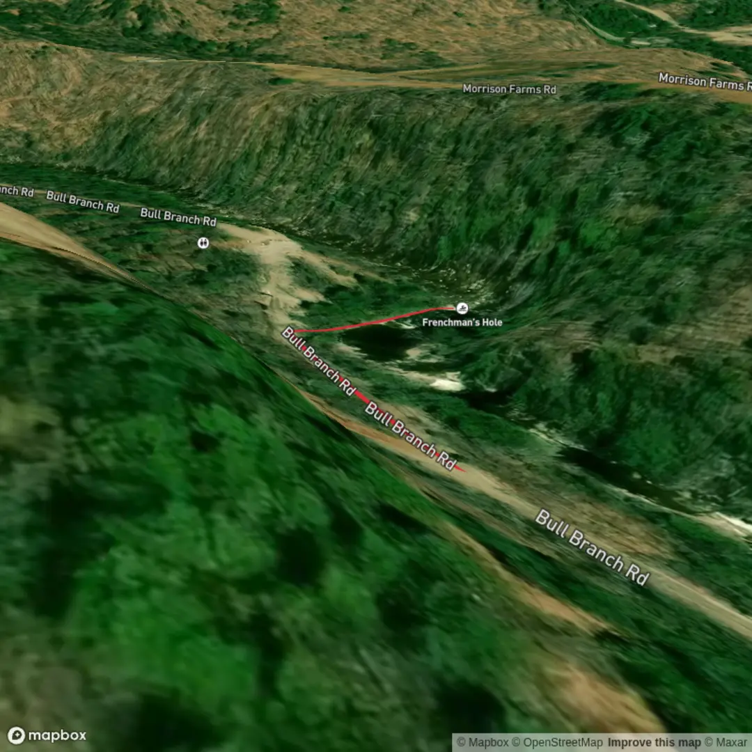 An image depicting the trail Frenchman's Hole Waterfall and its surrounding area.
