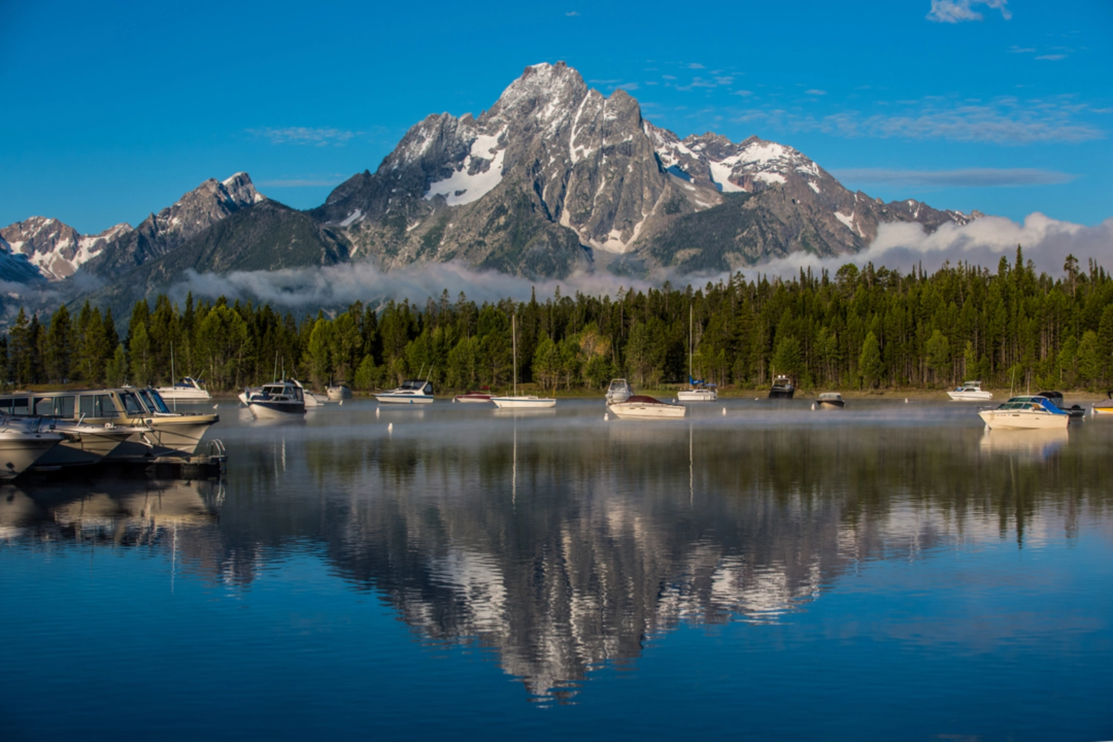 An image depicting the trail Colter Bay Lakeshore Trail and its surrounding area.