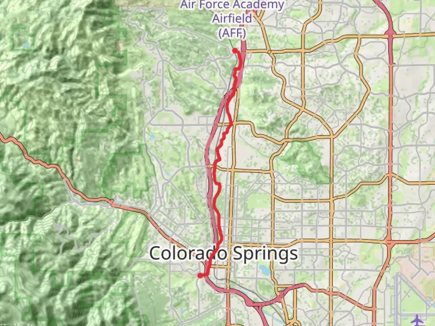 An image depicting the trail Pikes Peak Greenway and Bear Creek Trail and its surrounding area.
