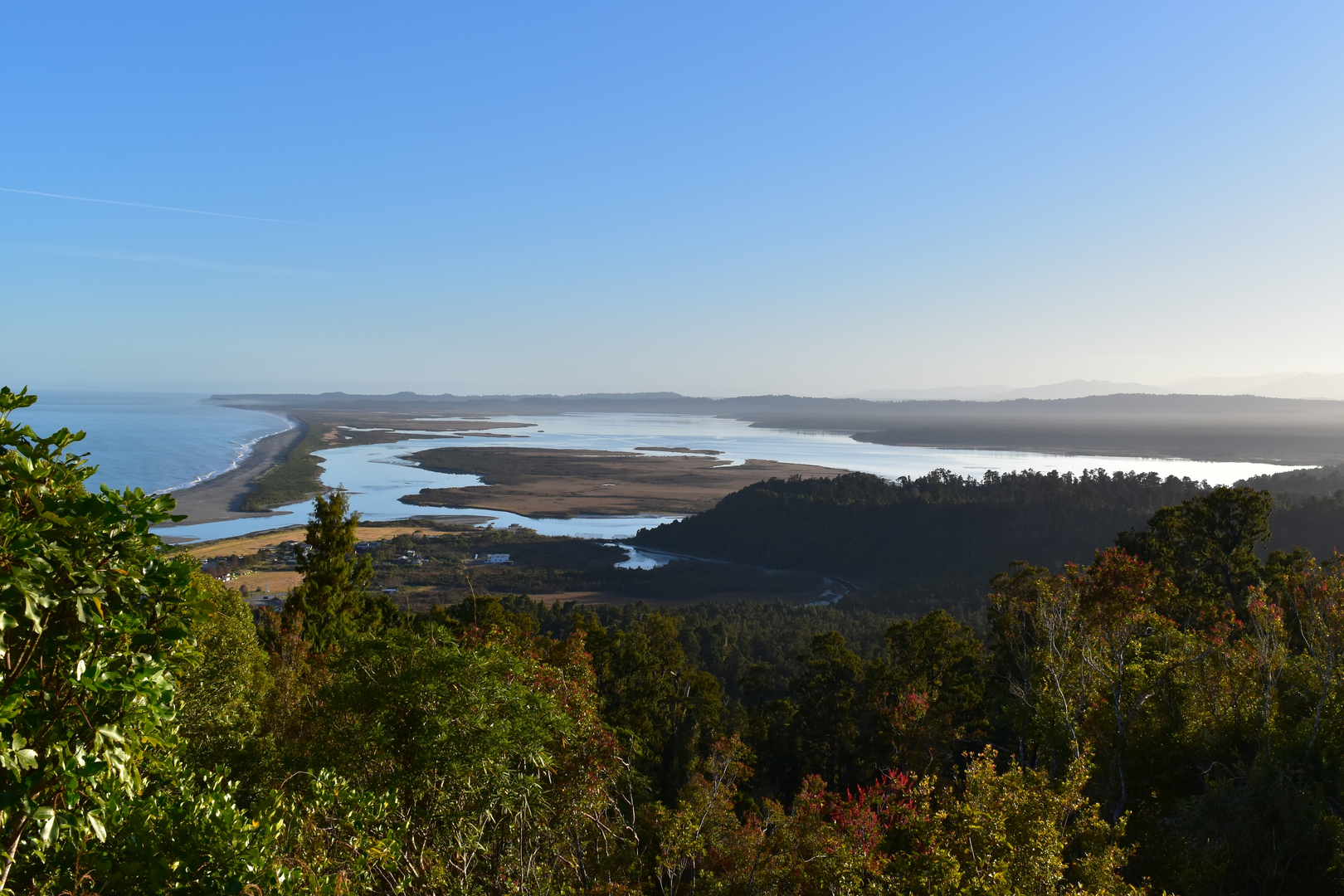 An image depicting the trail Ōkārito Trig Walk and its surrounding area.