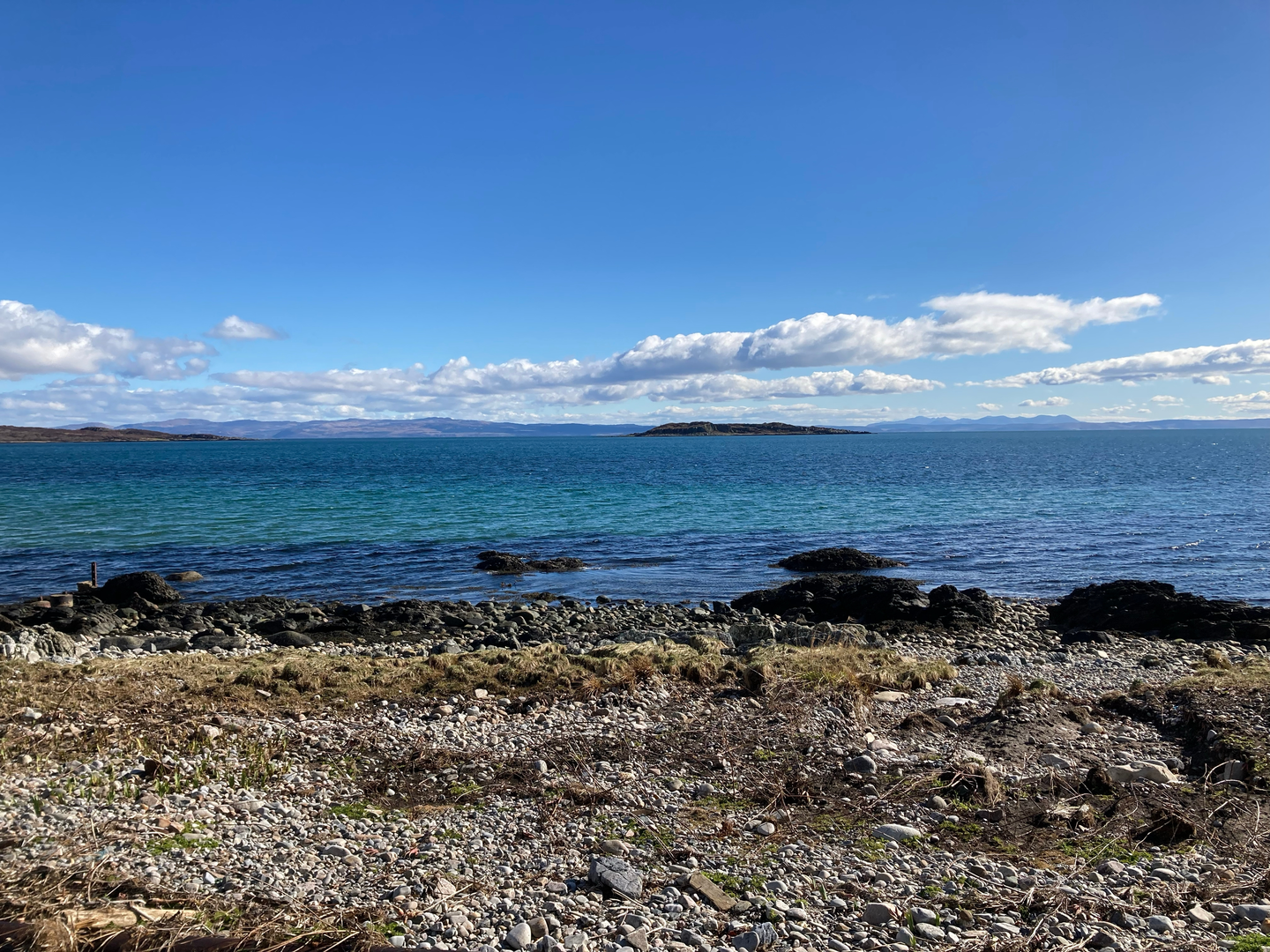 An image depicting the trail Ceann Min na Beinne Brice from Ardlussa and its surrounding area.