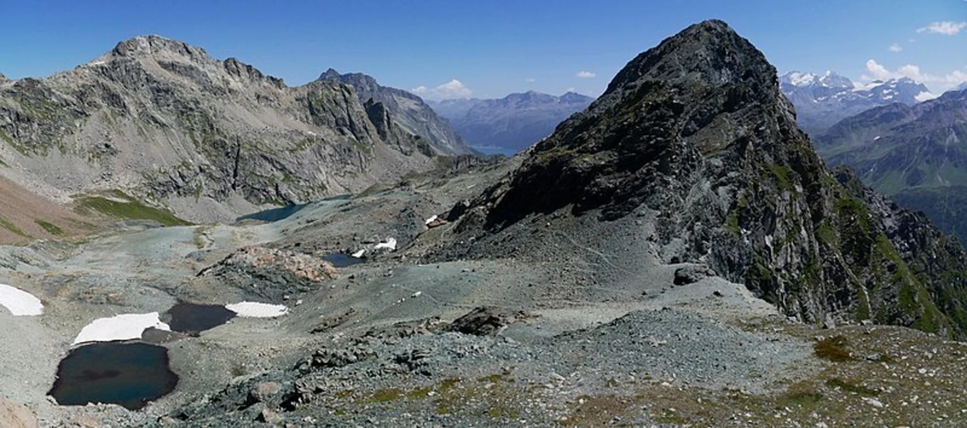 An image depicting the trail Maloja to Fuorcla Grevasalvas - Lagh dal Lunghin and its surrounding area.