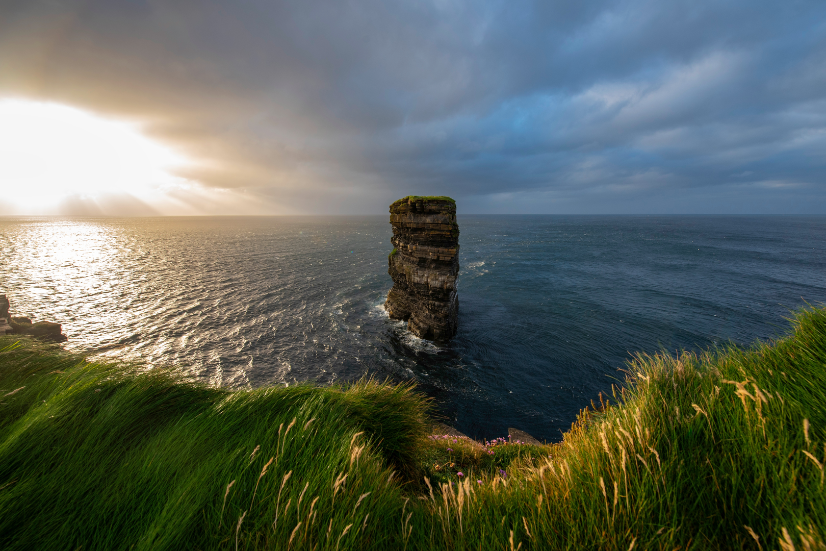 An image depicting the trail Downpatrick Head Loop Walk and its surrounding area.