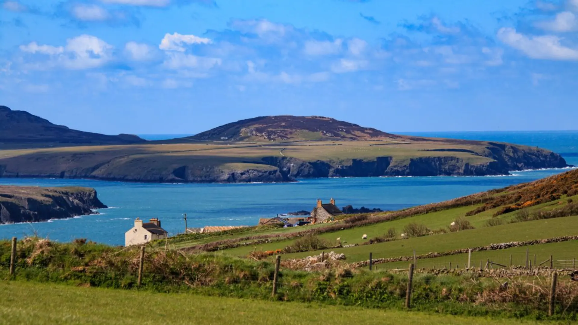 An image depicting the trail Wales Coast Path and its surrounding area.