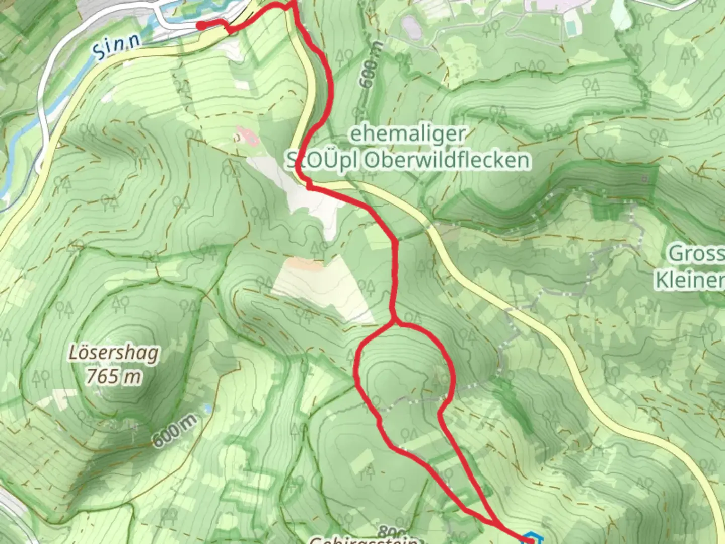 An image depicting the trail Feuerberg via Kreuzbergweg and Rhoen Hoehenweg and its surrounding area.