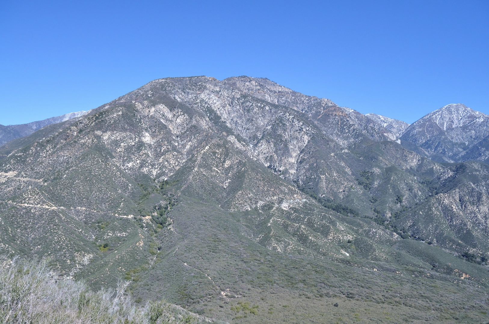 An image depicting the trail Ontario Peak and Bighorn Peak via Icehouse Canyon Trail and its surrounding area.