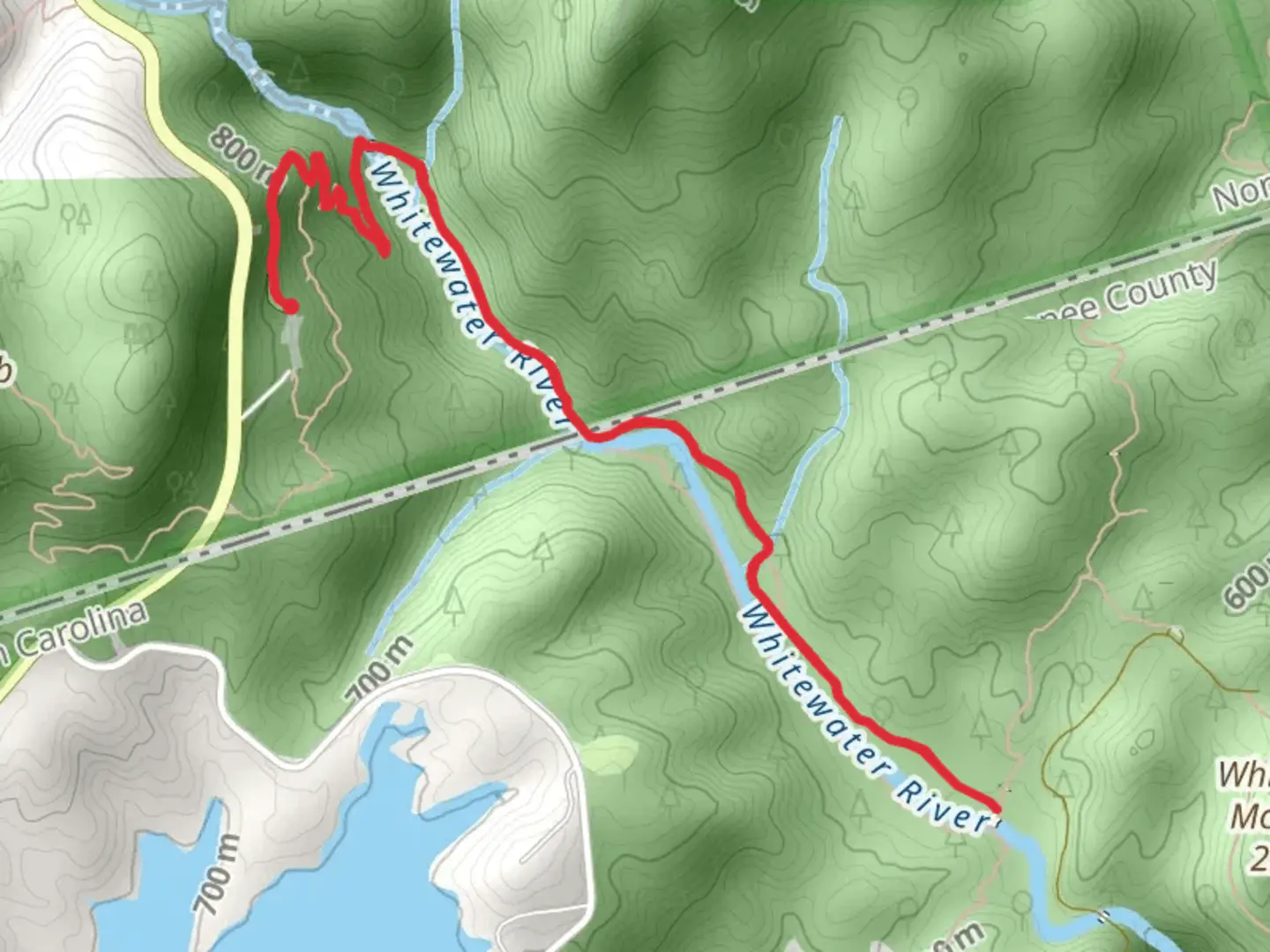 An image depicting the trail Whitewater River - Foothills Trail and its surrounding area.