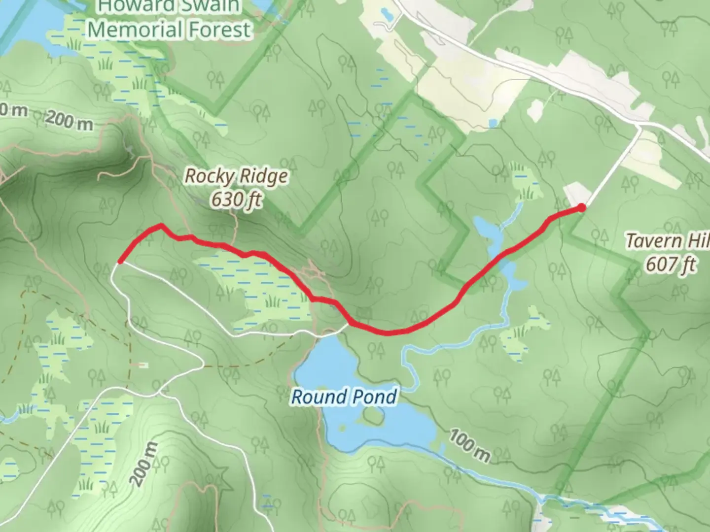 An image depicting the trail Boulder Trail from Round Pond Road and its surrounding area.