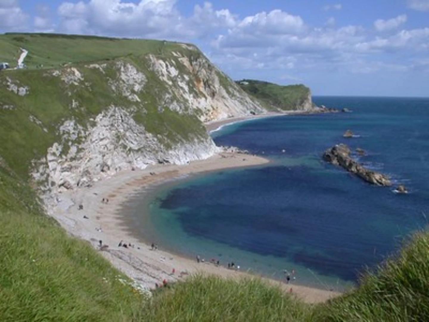 An image depicting the trail Lulworth Cove and its surrounding area.