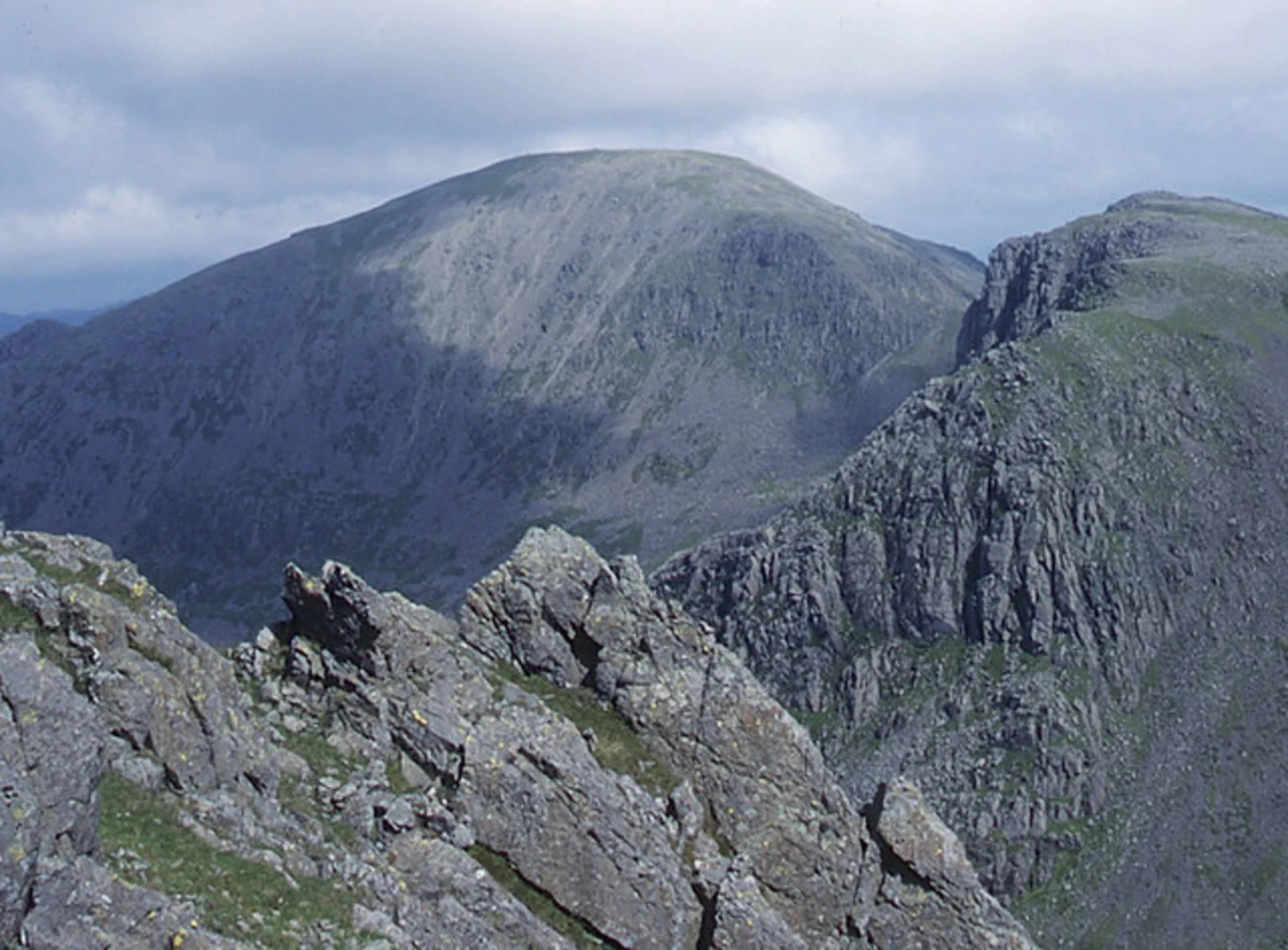 An image depicting the trail Scoat Fell, Haycock and Iron Crag Loop via Ennerdale Water and its surrounding area.