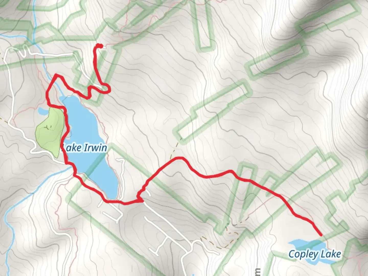 An image depicting the trail Irvin Lake and Copley Lake Trail and its surrounding area.