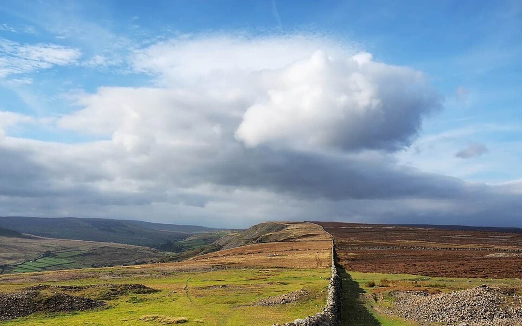 An image depicting the trail Reeth and Langthwaite Loop via Reeth High Moor and its surrounding area.