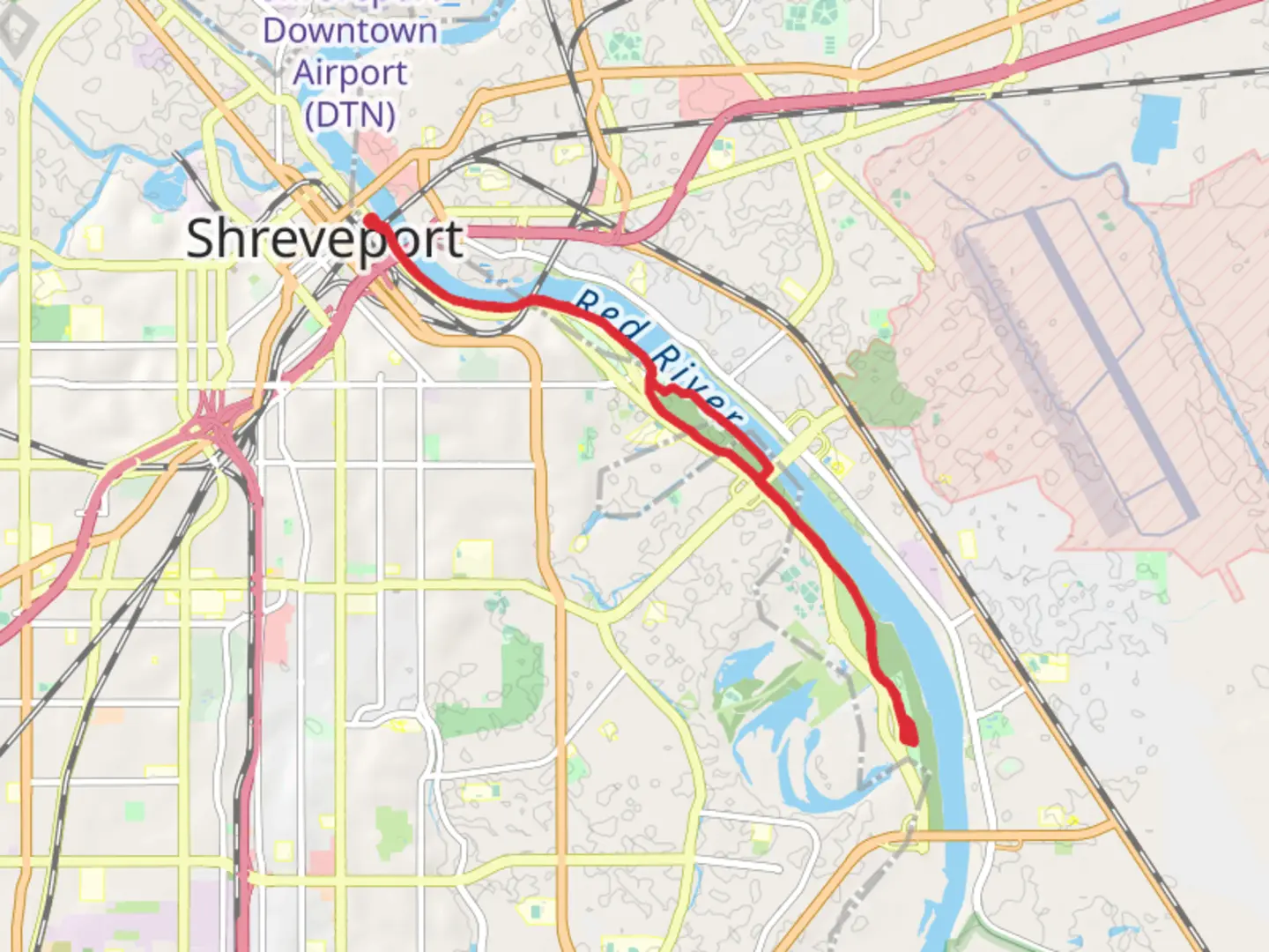 An image depicting the trail Walk along Red River - Shreverpost Riverview Park and its surrounding area.