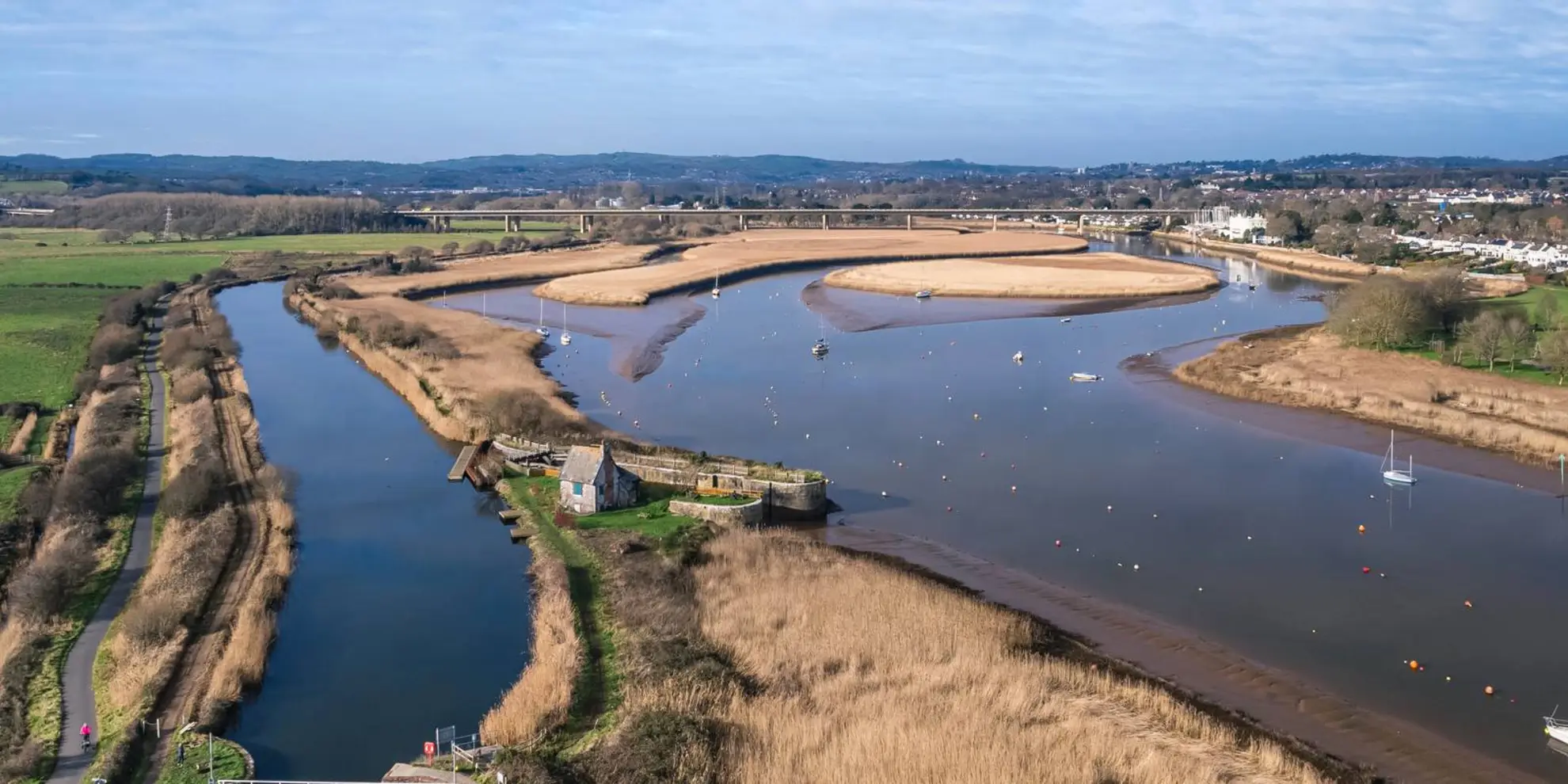 An image depicting the trail Avocet Line - Topsham Station to Countess Wear Walk and its surrounding area.