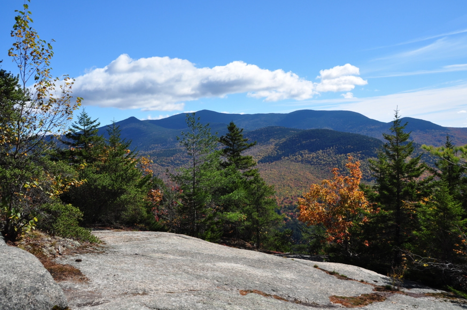 An image depicting the trail Sandwich Mountain via Smart's Brook Trail and its surrounding area.