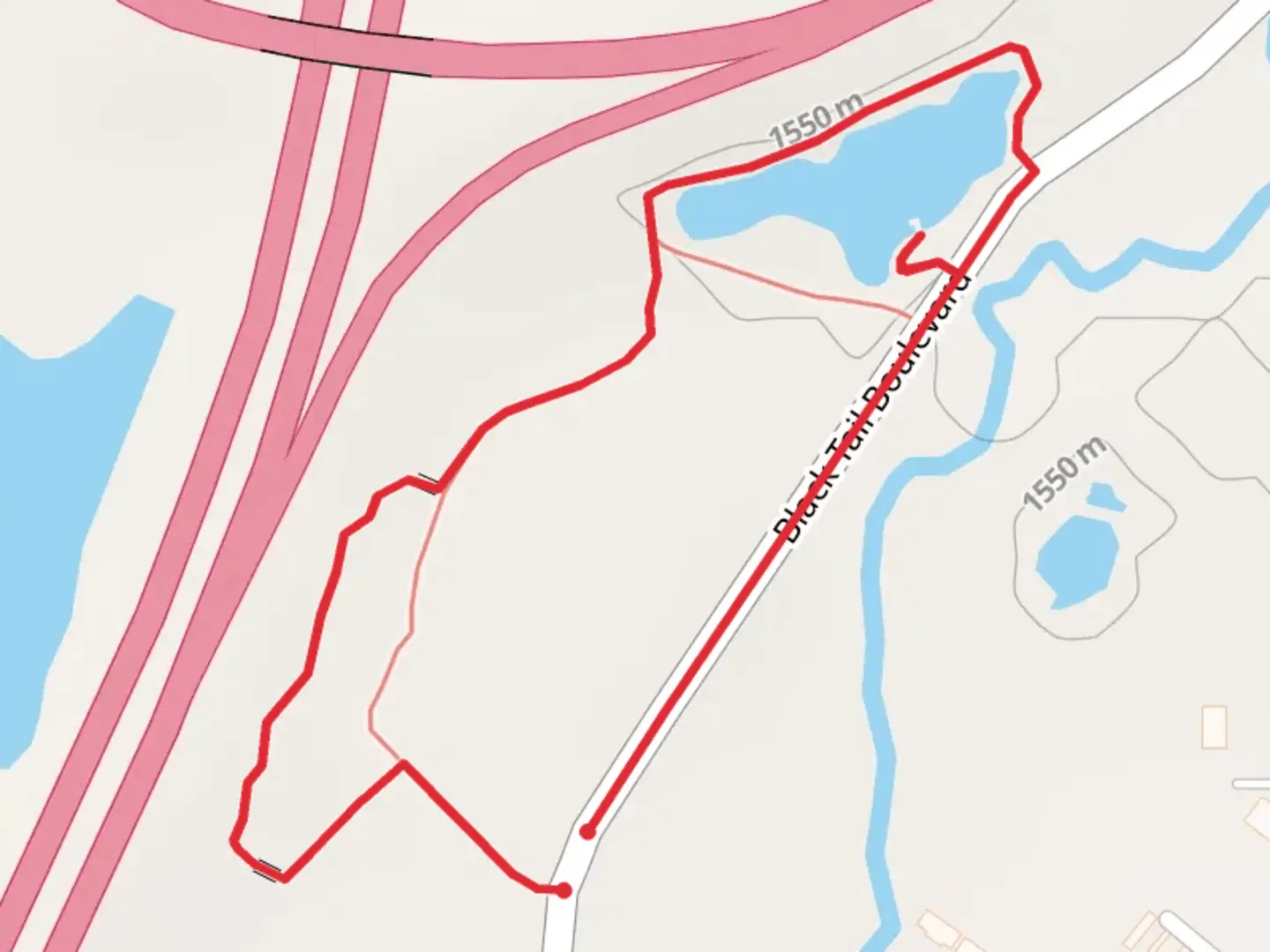 An image depicting the trail Black Tail Boulevard Loop and its surrounding area.