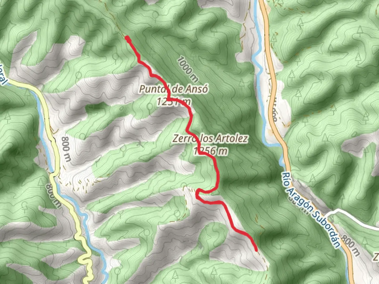 An image depicting the trail Cabañera of the Sierra de los dos Ríos PR HU 19 and its surrounding area.