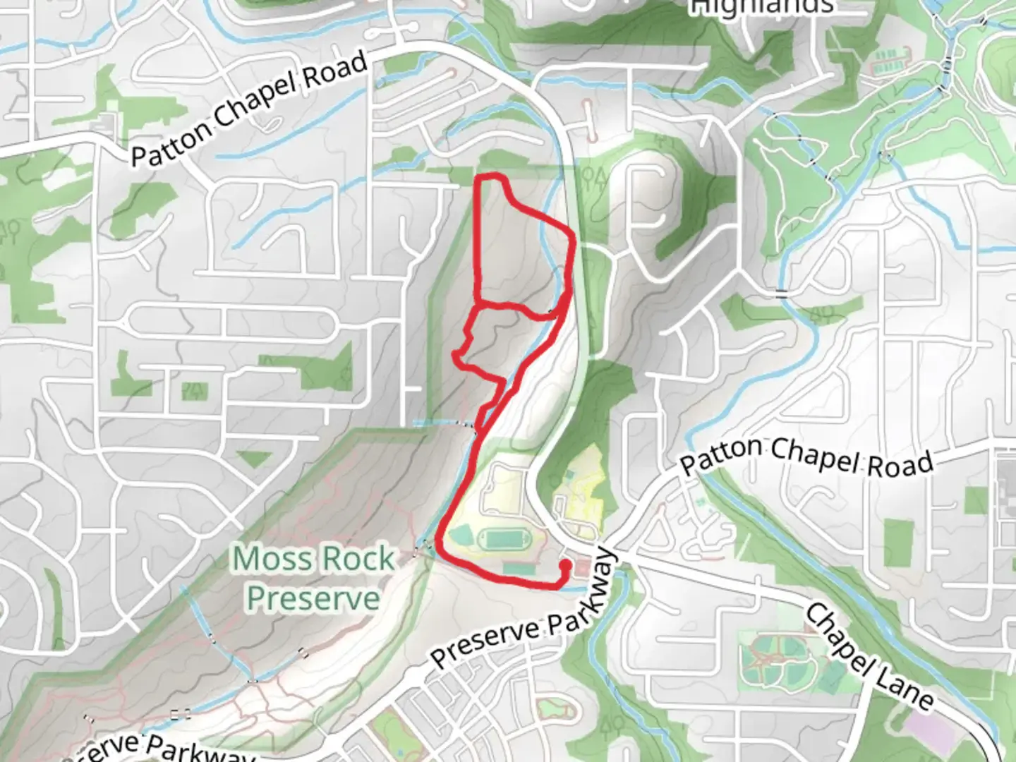 An image depicting the trail Moss Rock Preserve White and Orange Loop Trail and its surrounding area.