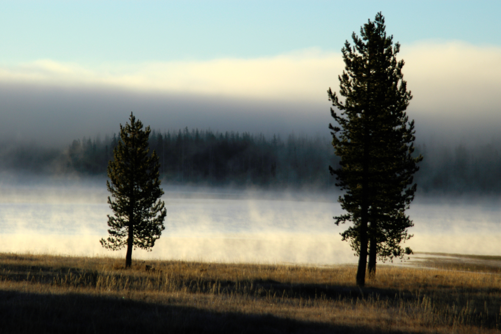 An image depicting the trail Medicine Lake Glass Flow Trail and its surrounding area.
