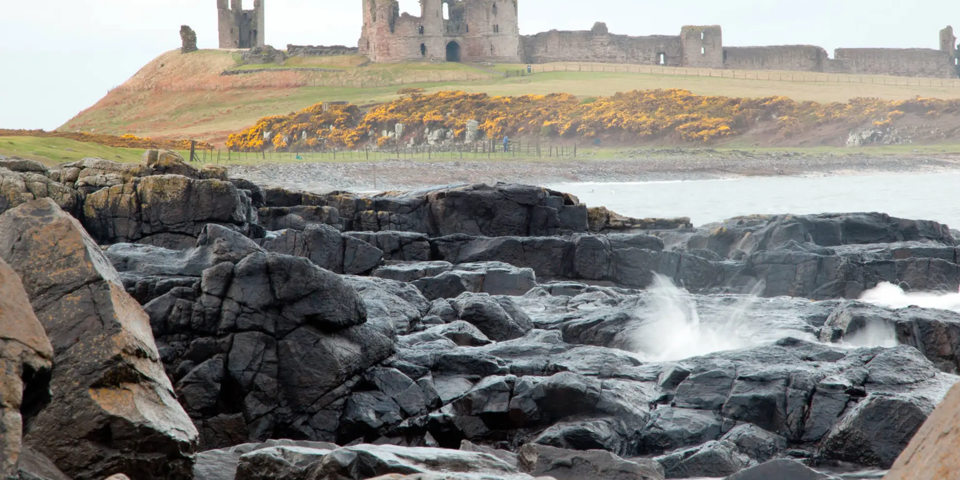 An image depicting the trail Craster to Low Newton Coastal Walk and its surrounding area.