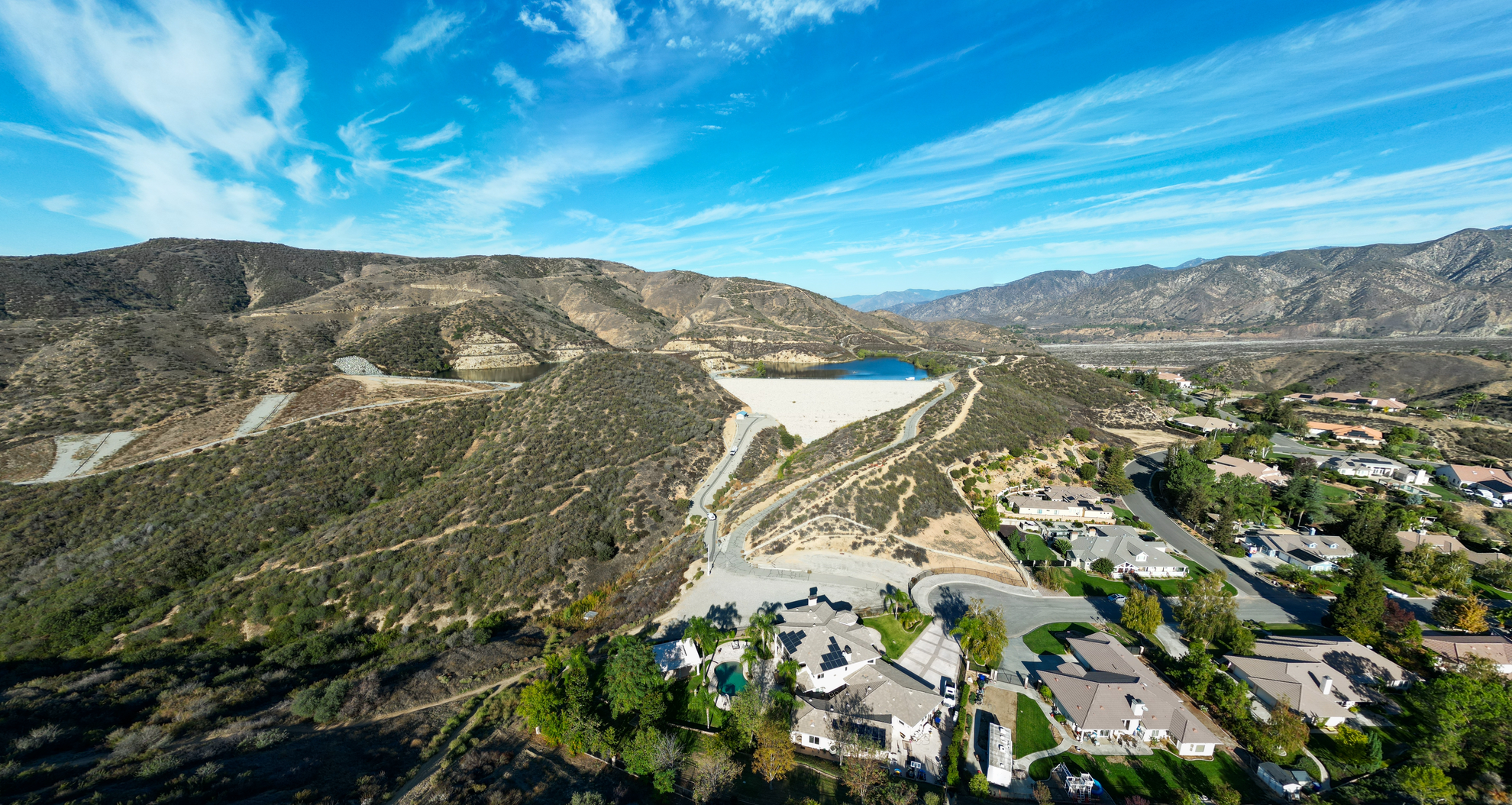 An image depicting the trail Three Hawks Trail and Crafton Hills Reservoir and its surrounding area.