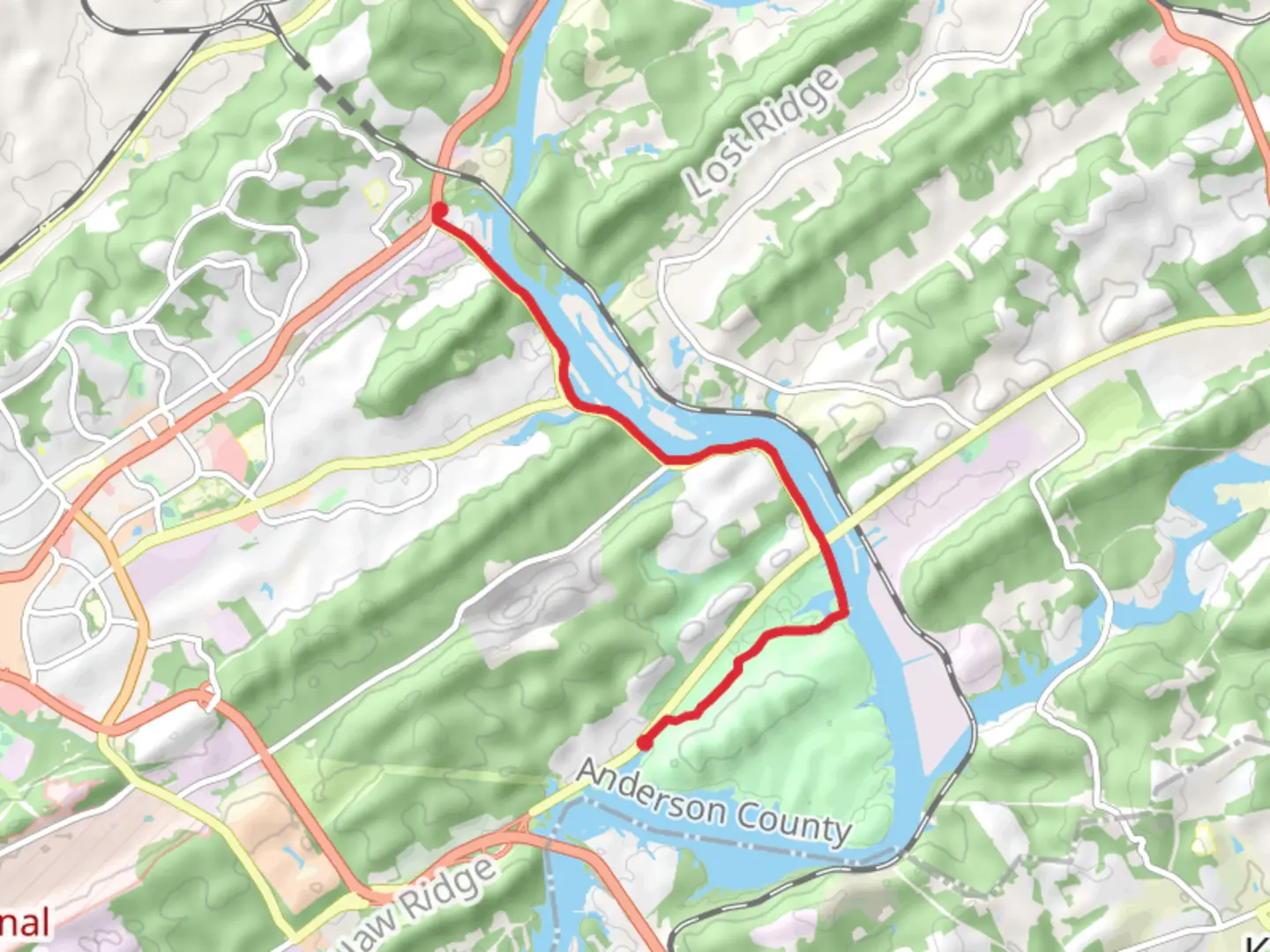 An image depicting the trail Melton Lake Greenway and its surrounding area.