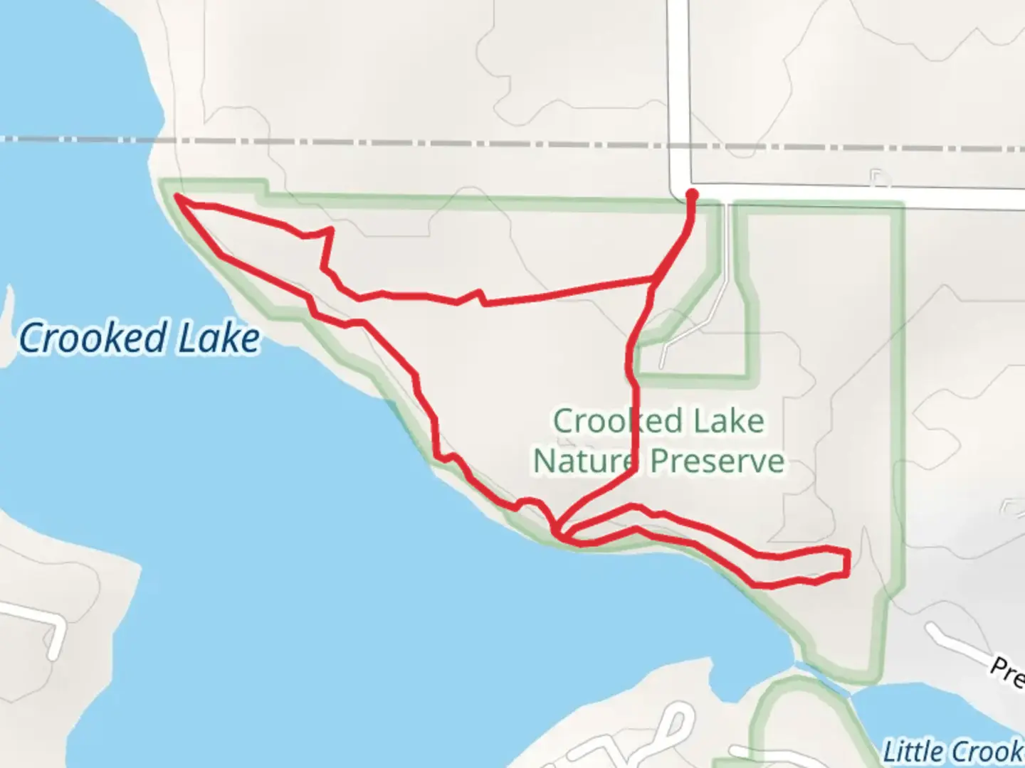 An image depicting the trail Crooked Lake Nature Preserve Loop Trail and its surrounding area.