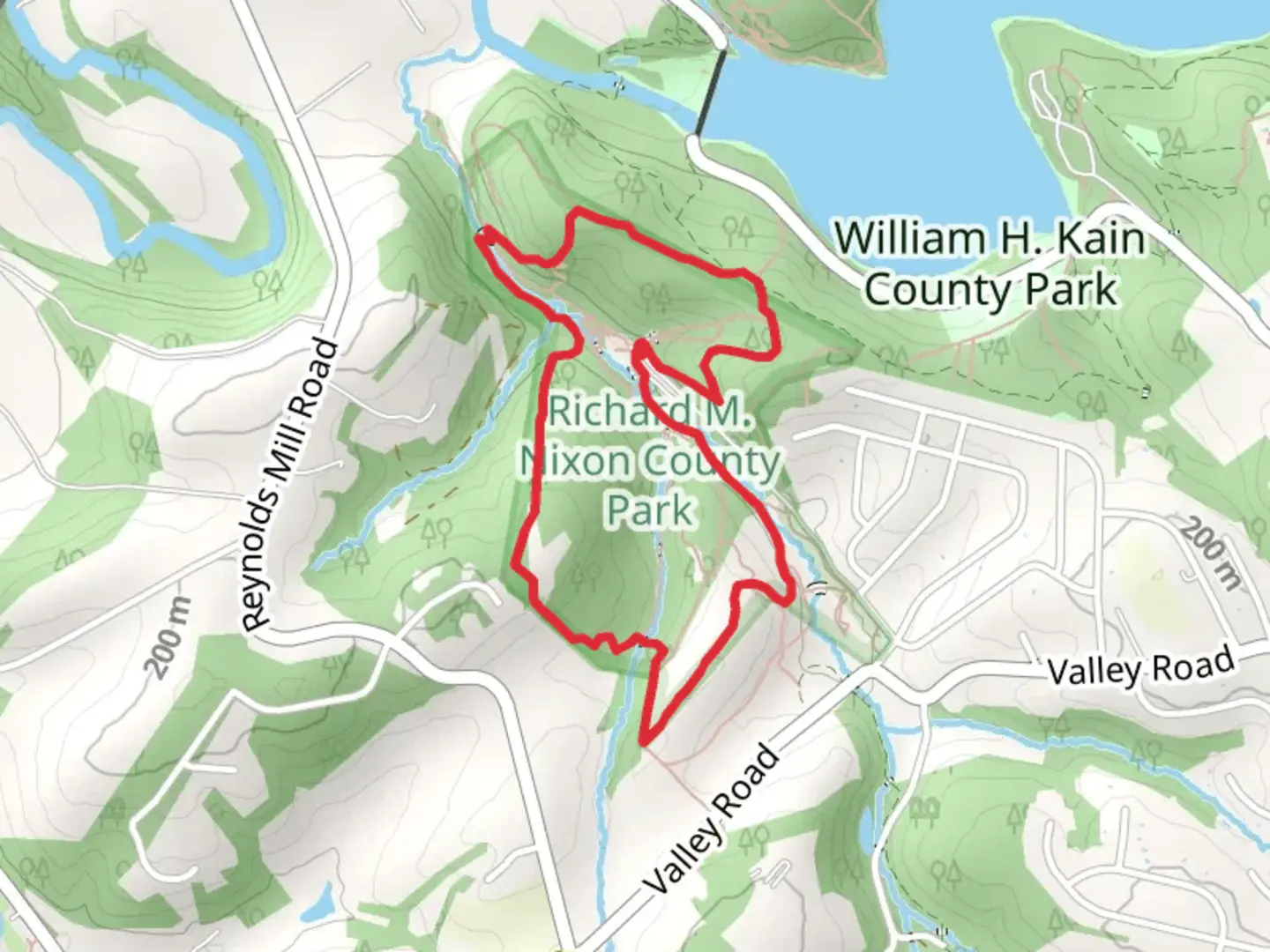 An image depicting the trail William H Kain County Park West Loop from Nixon Drive and its surrounding area.