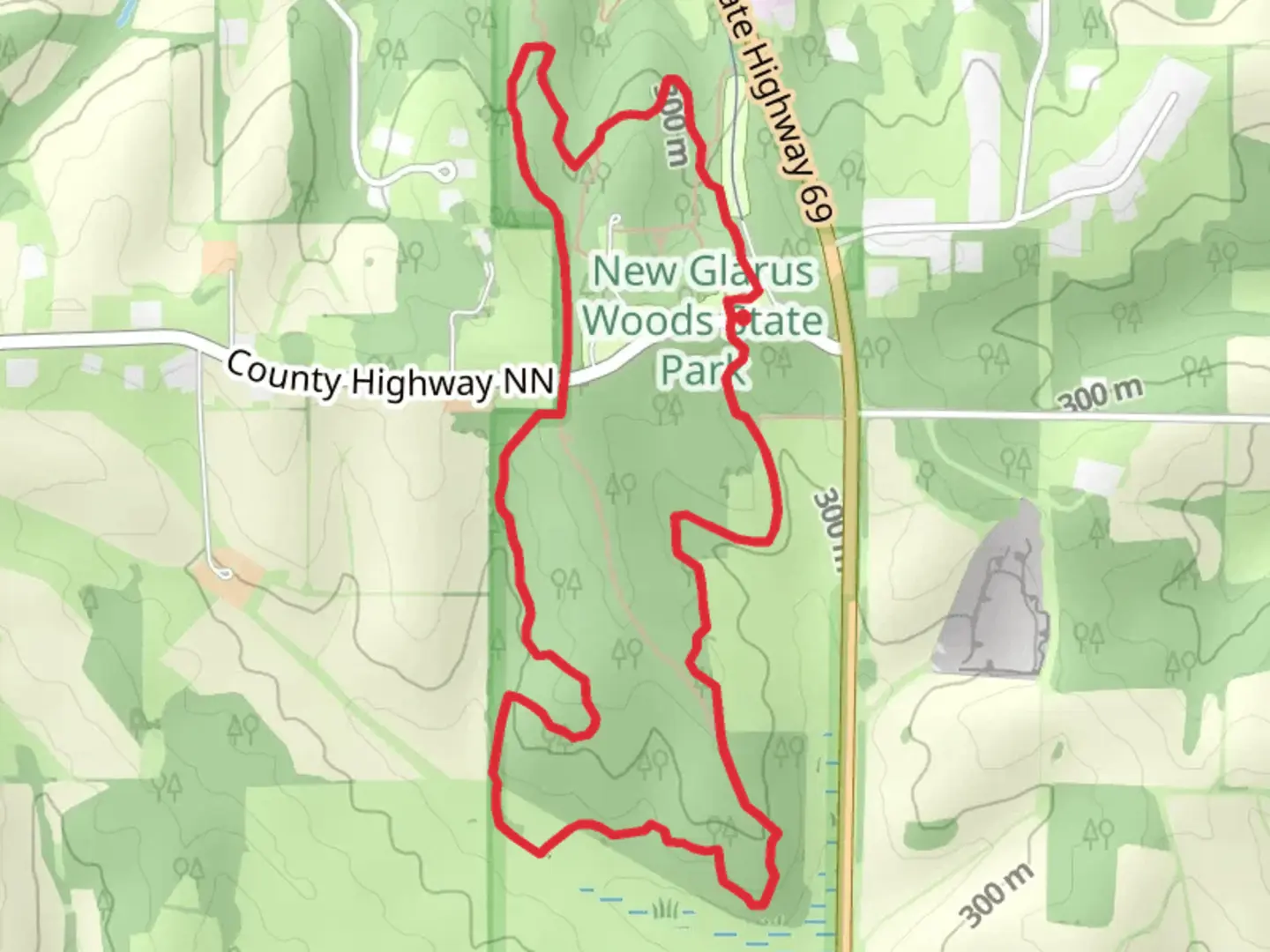 An image depicting the trail New Glarus Woods State Park Loop and its surrounding area.