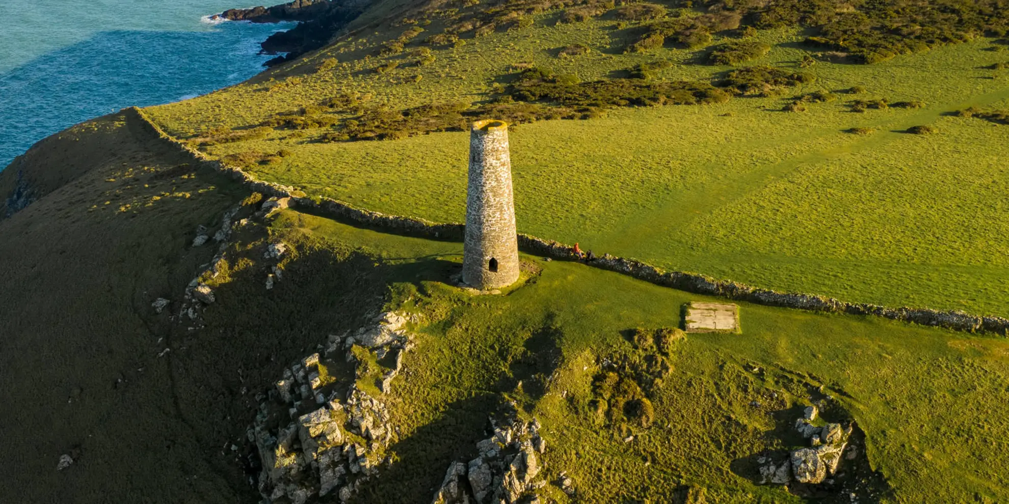 An image depicting the trail Stepper Point from Trevone Walk and its surrounding area.